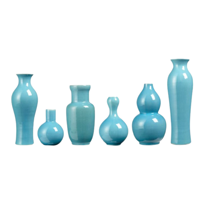 ABSTRACT SHAPED TURQUOISE VASE