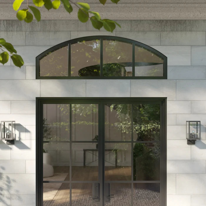 Exterior arch top steel window with dual-pane tempered glazing