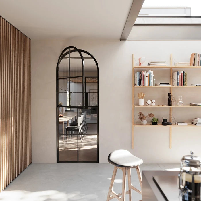 Air 5 Dutch interior steel door with full arch top in OttoStumm hot-rolled steel with slim profiles and removable threshold