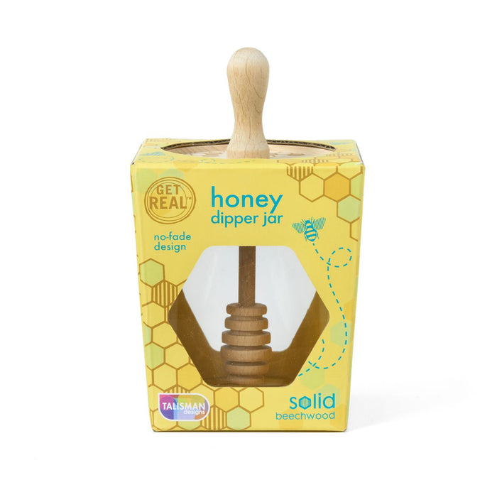 Honey dipper jar packaging with wooden handle on a white background