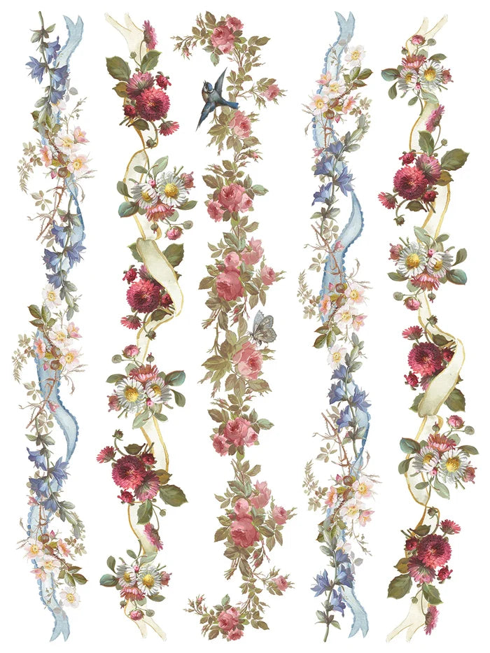 Decorative floral garland with ribbons on a white background