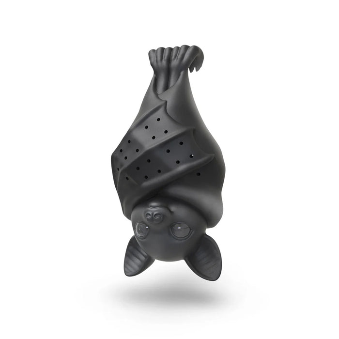 A matte black bat-shaped tea infuser holder, shown hanging upside down against a clean white background with a soft drop shadow.