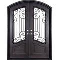 Piano bronze colored metal arched top door with thermal break and glass.