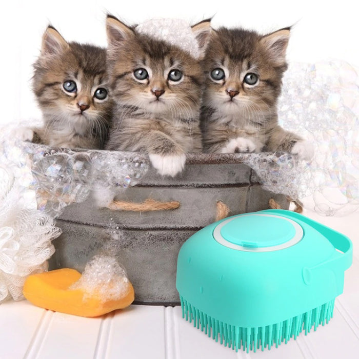 Two domestic short hair cats next to a green Silicone Pet Bath Brush