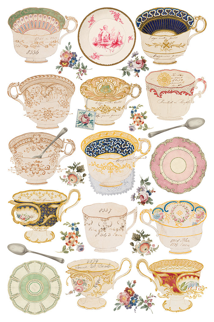 Collection of decorative teacups and saucers with floral patterns and spoons on a white background.